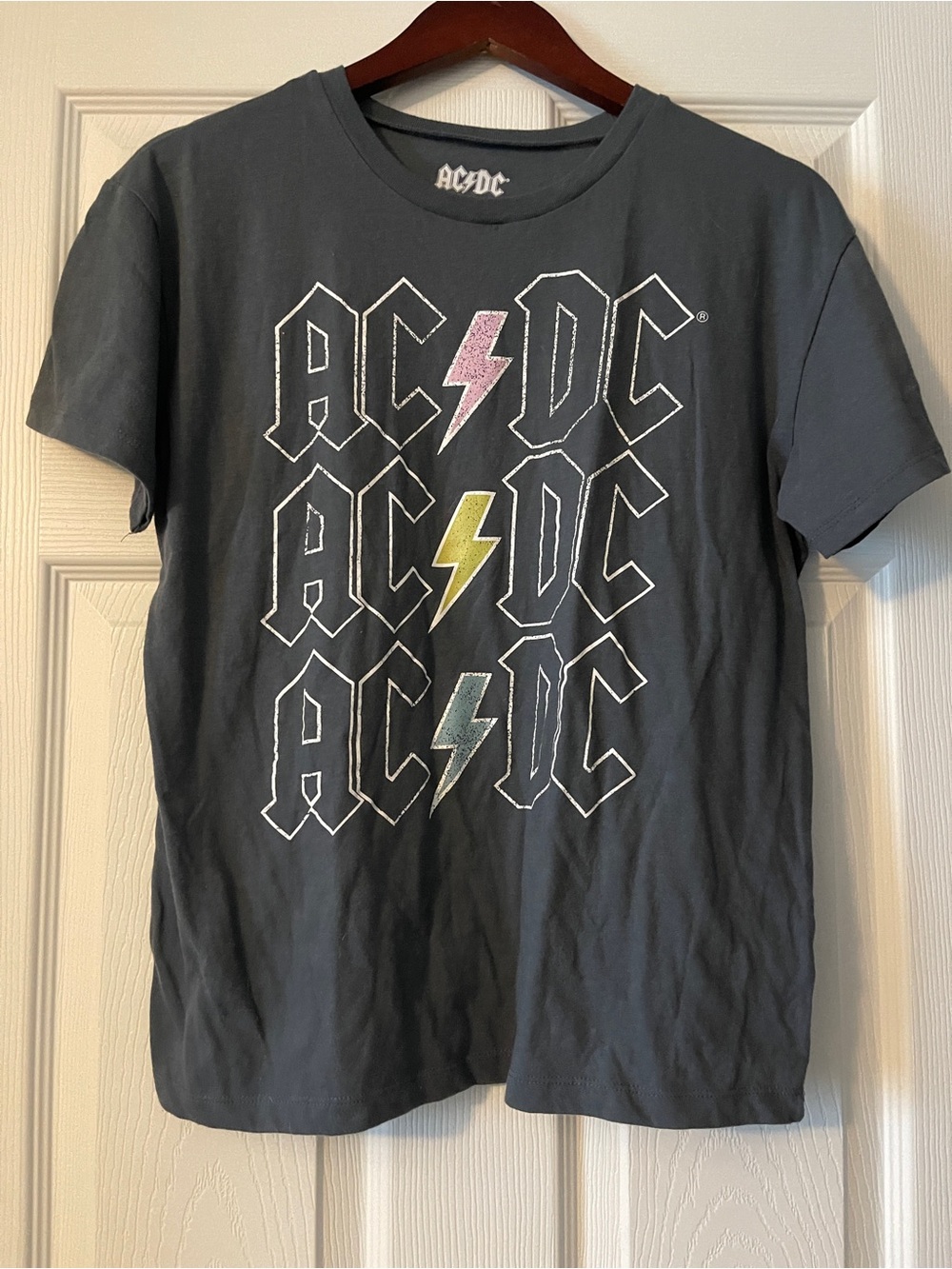 AC/DC Black Tee with Pink, Yellow, and Teal Lightning Bolts
